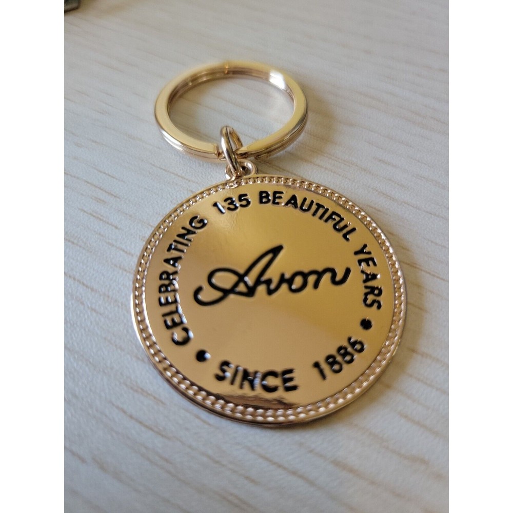 Avon Studio 1886 Coin KeyChain Key Fob Key Holder 135 Years Anniversary Goldtone